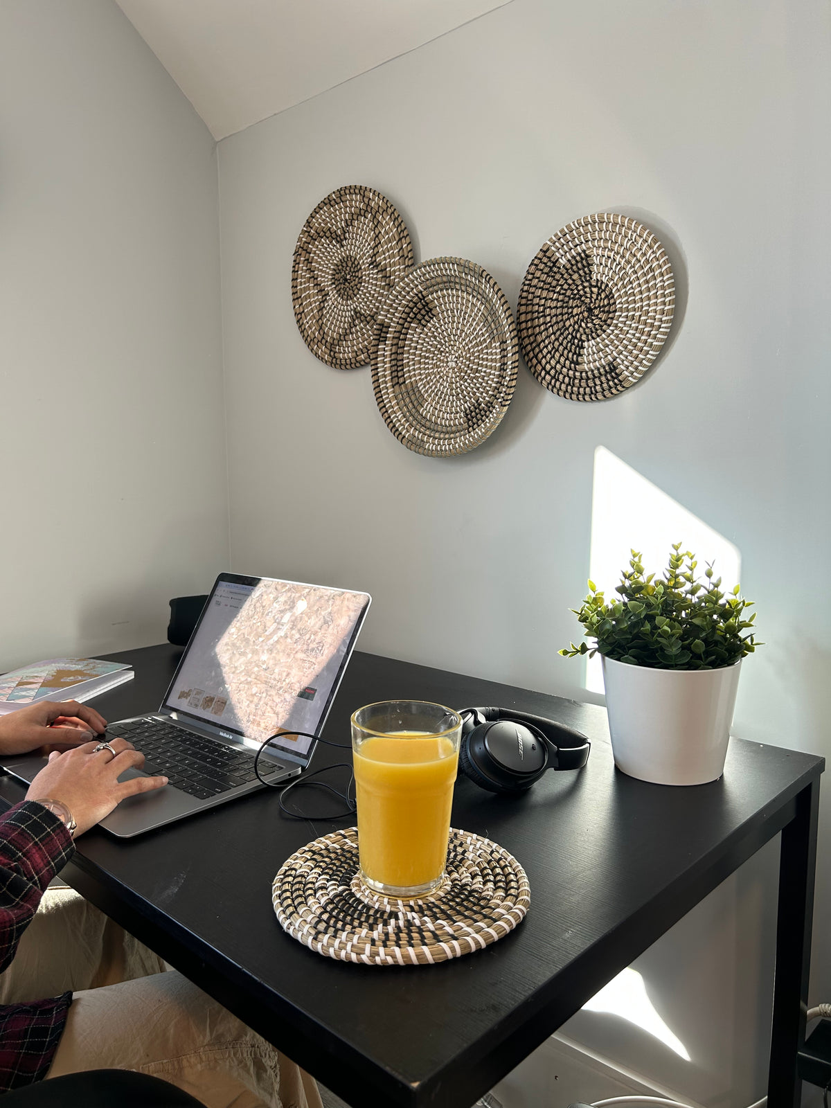 Modern bedroom featuring handcrafted seagrass wall décor by Tribal Touches, showcasing precision, passion, and timeless artistry