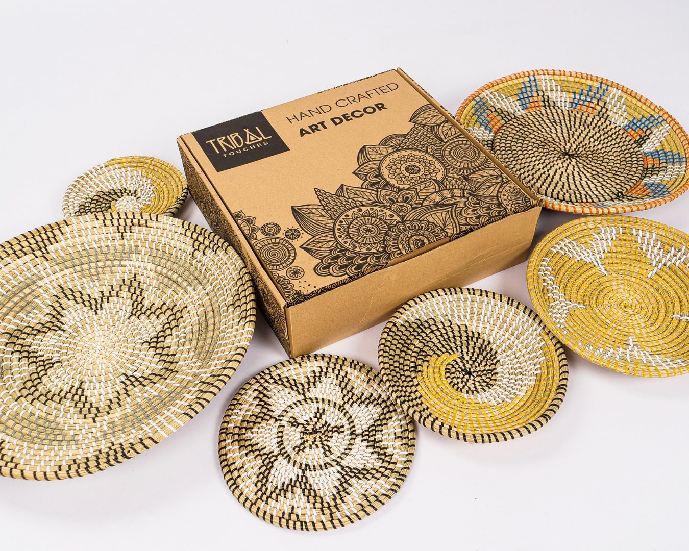 Golden Horizon handcrafted wall décor set with intricate seagrass designs and vibrant yellow accents, beautifully packed in an artisan box.