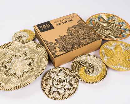 Golden Horizon handcrafted wall décor set with intricate seagrass designs and vibrant yellow accents, beautifully packed in an artisan box.
